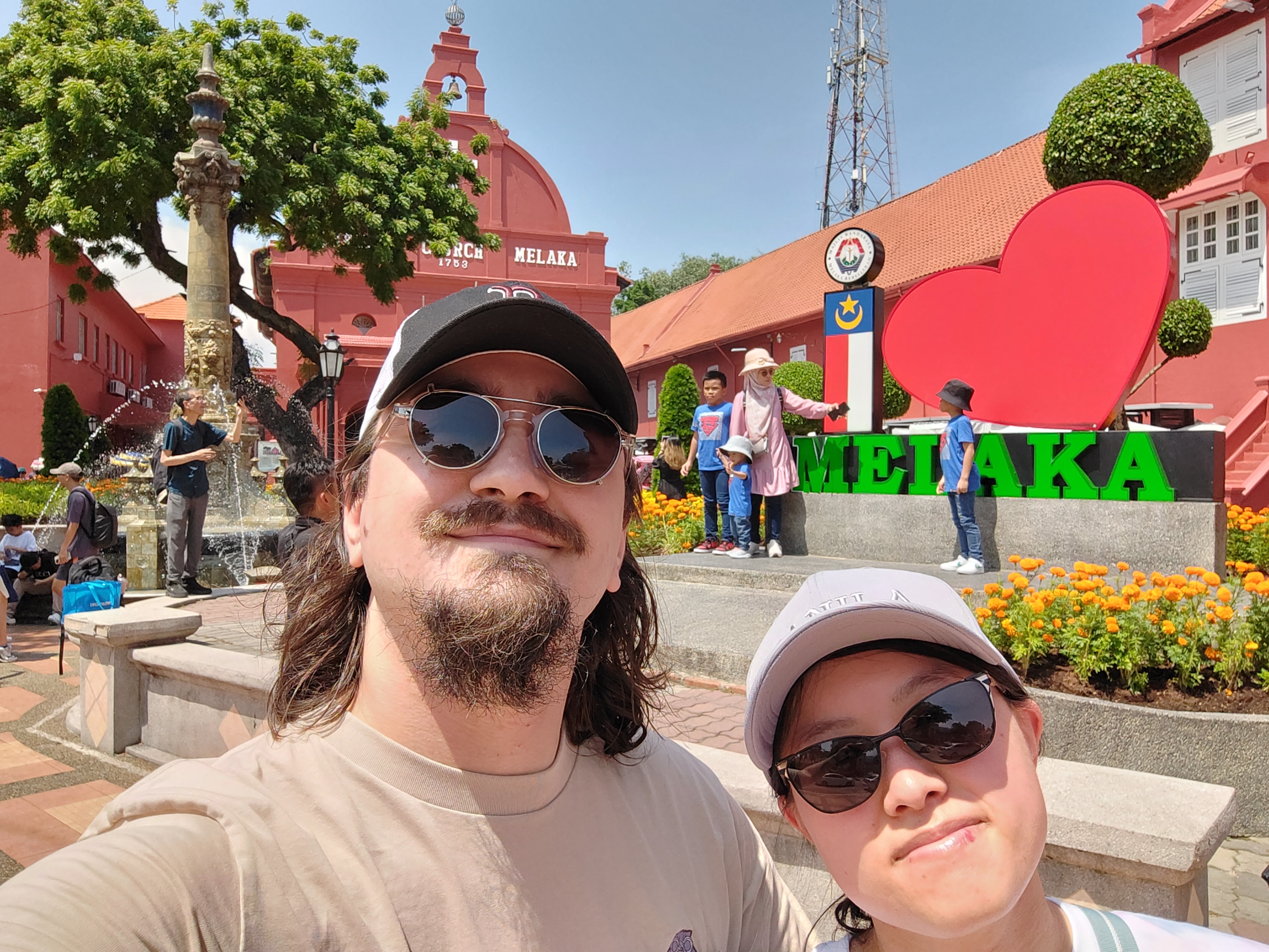 Megan and Andrew in front of the I <3 Melaka sign in Malacca, Malaysia.