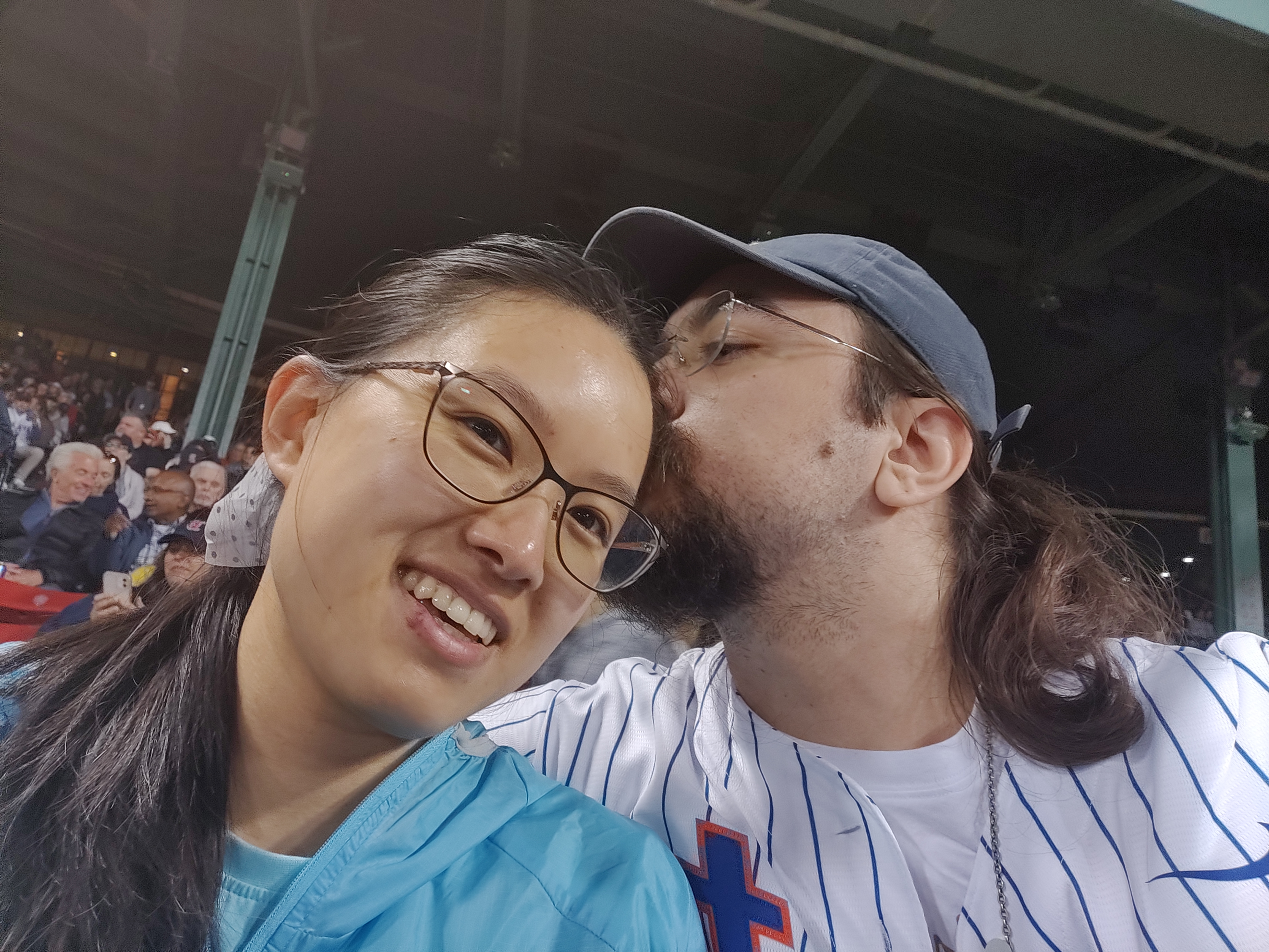 Megan and Andrew in the stands for a Red Sox game at Fenway Park